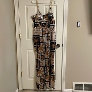 Fitted Guess pant jumpsuit. Shiny Gold, beige, green, black.